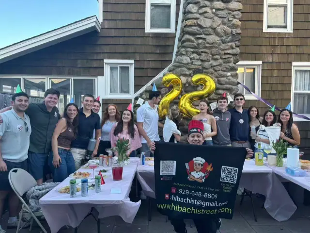 A birthday gathering after an outdoor hibachi meal